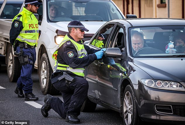 30689738-8515961-COVID_19_checkpoints_have_been_set_up_in_and_around_Victoria_in_-a-29_1595501893037.jpg,0