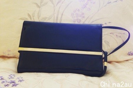 A Hong Kong-made vintage blue handbag made with the 1990s style