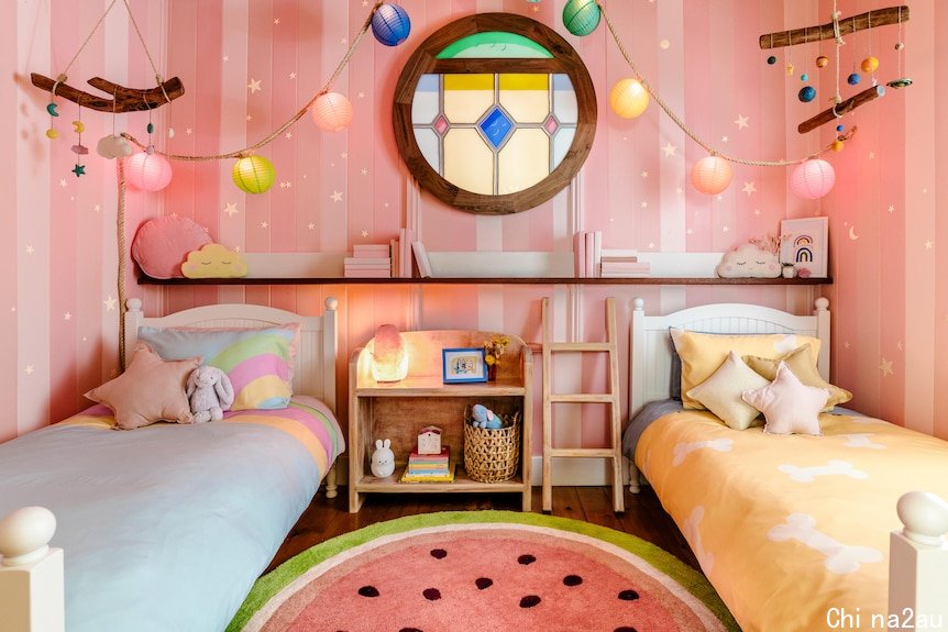 A pink and blue bedroom replicating the room for Bluey in the children's cartoon show