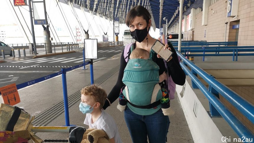 Vivian and her kids at Sydney Airport