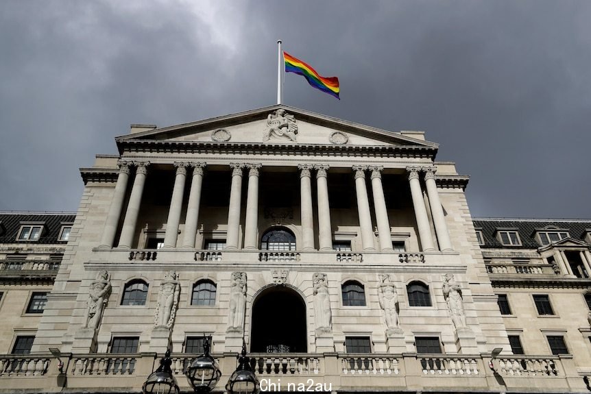 The rainbow flag flies above the Bank of England to celebrate the unveiling of the new 50-pound note in London.