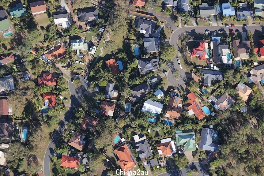 An aerial photo looking down from a hot air balloon into a suburb