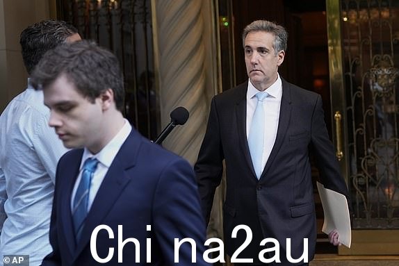 Michael Cohen 离开公寓楼前往曼哈顿纽约刑事法庭，2024 年 5 月 14 日星期二。（美联社照片/Seth Wenig）