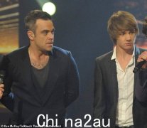 罗比·威廉姆斯 (Robbie Williams) 分享了《X Factor》学员利亚姆·佩恩 (Liam Payne) 发来的甜蜜短信，他谈到了他们相似的“考验和磨难”，以及他意外去世两天后